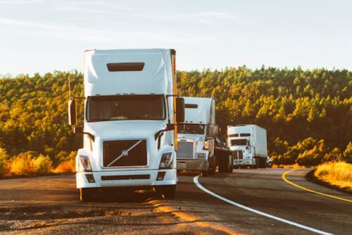 trucks driving together