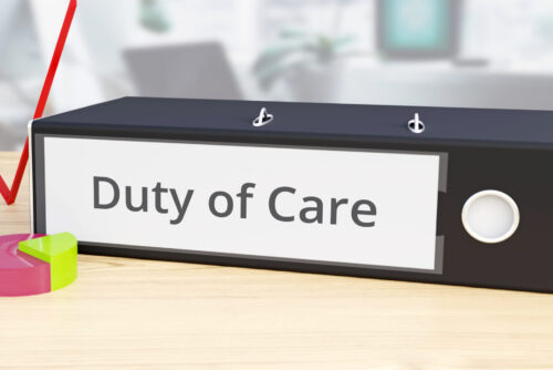 Duty of Care – Finance/Economy. Folder on desk with label beside diagrams. Business/statistics. 3d rendering
